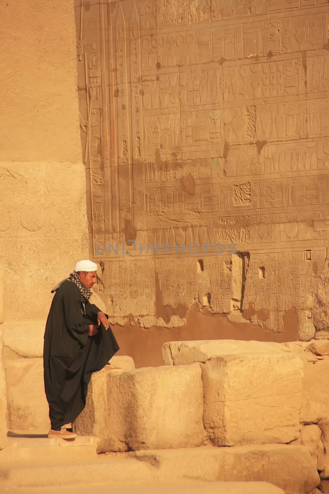 Local man standing at Karnak temple complex, Luxor, Egypt