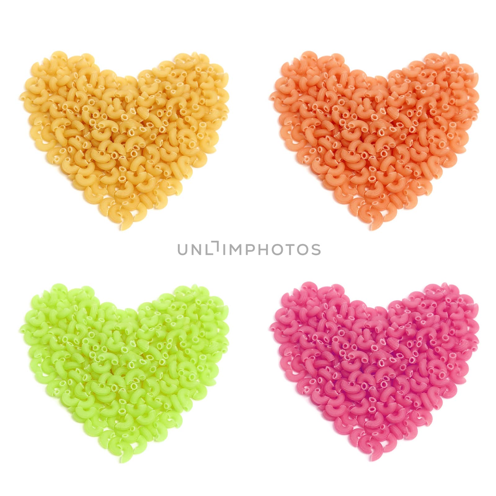 Colorful macaroni in heart shape isolated on white background 