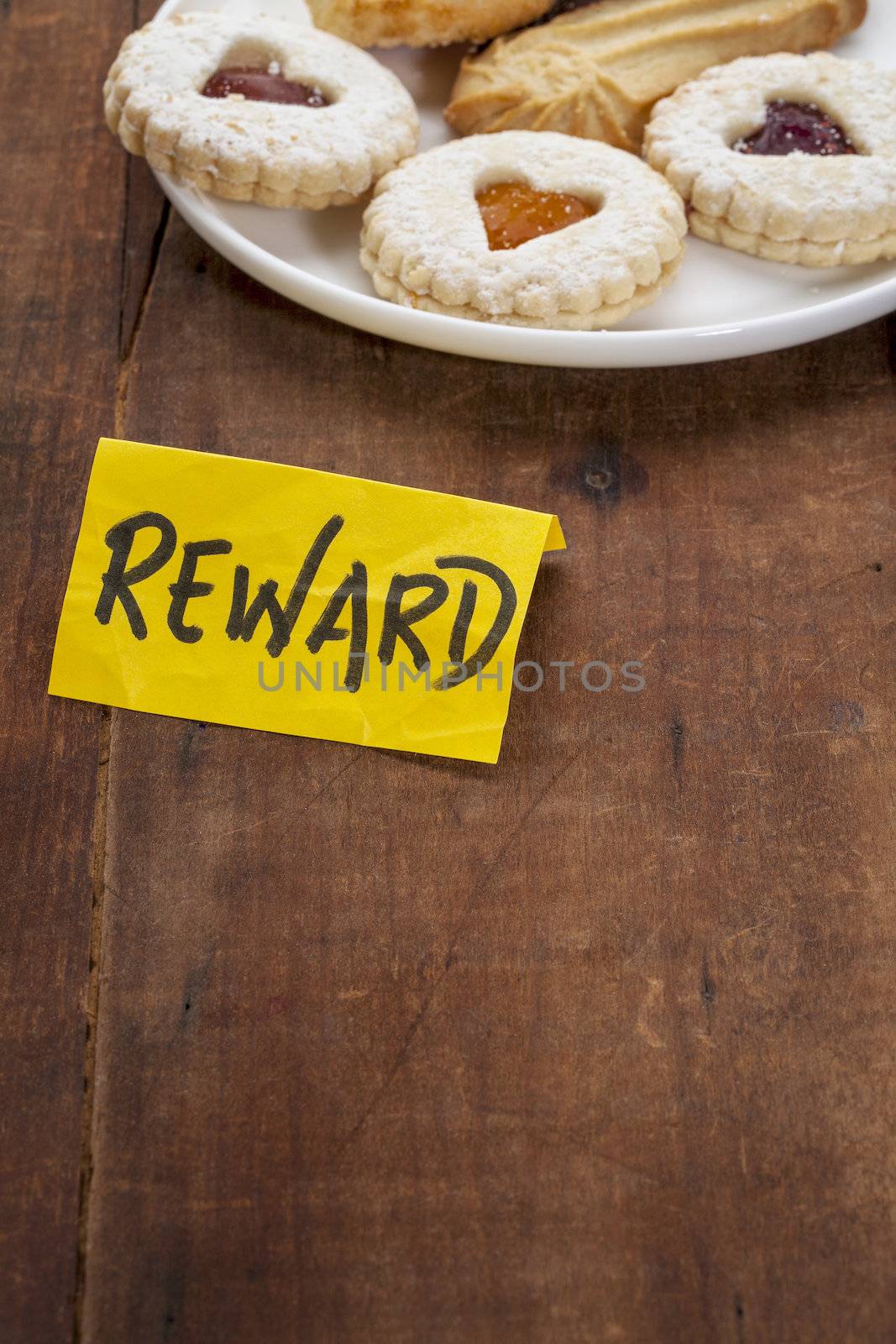 plate of cookies as a reward on a grunge wooden table