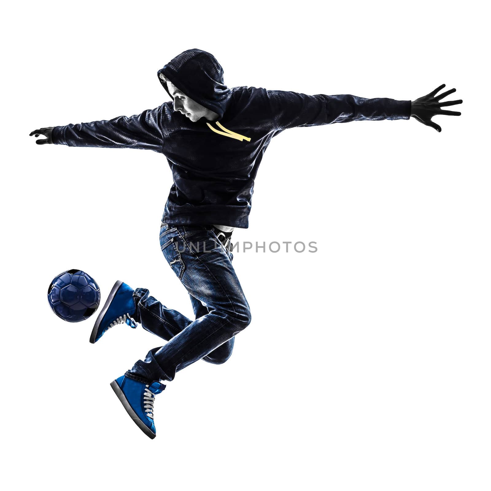 one caucasian young man soccer freestyler player  in silhouette  on white background