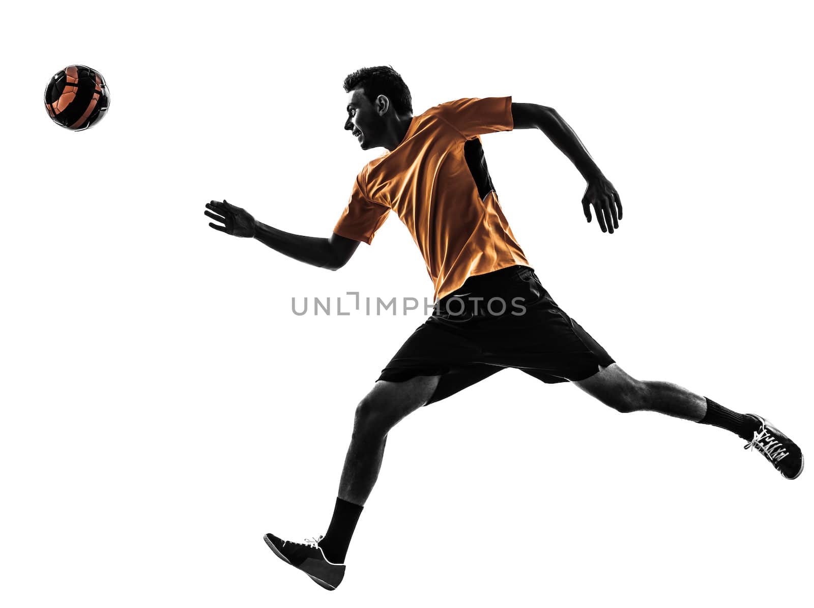 one caucasian young man soccer player orange jersey in silhouette  on white background