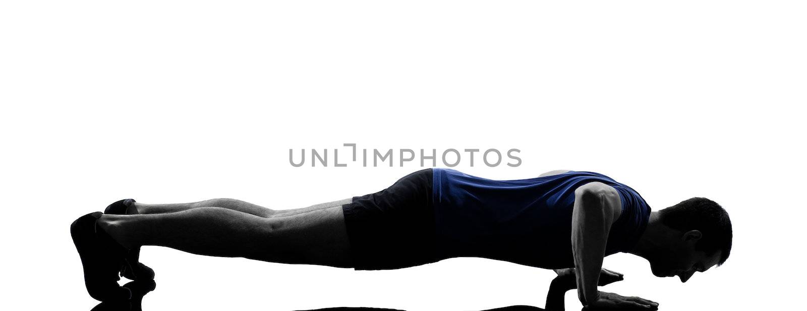 man exercising push ups workout fitness aerobics posture in silhouette studio isolated on white background