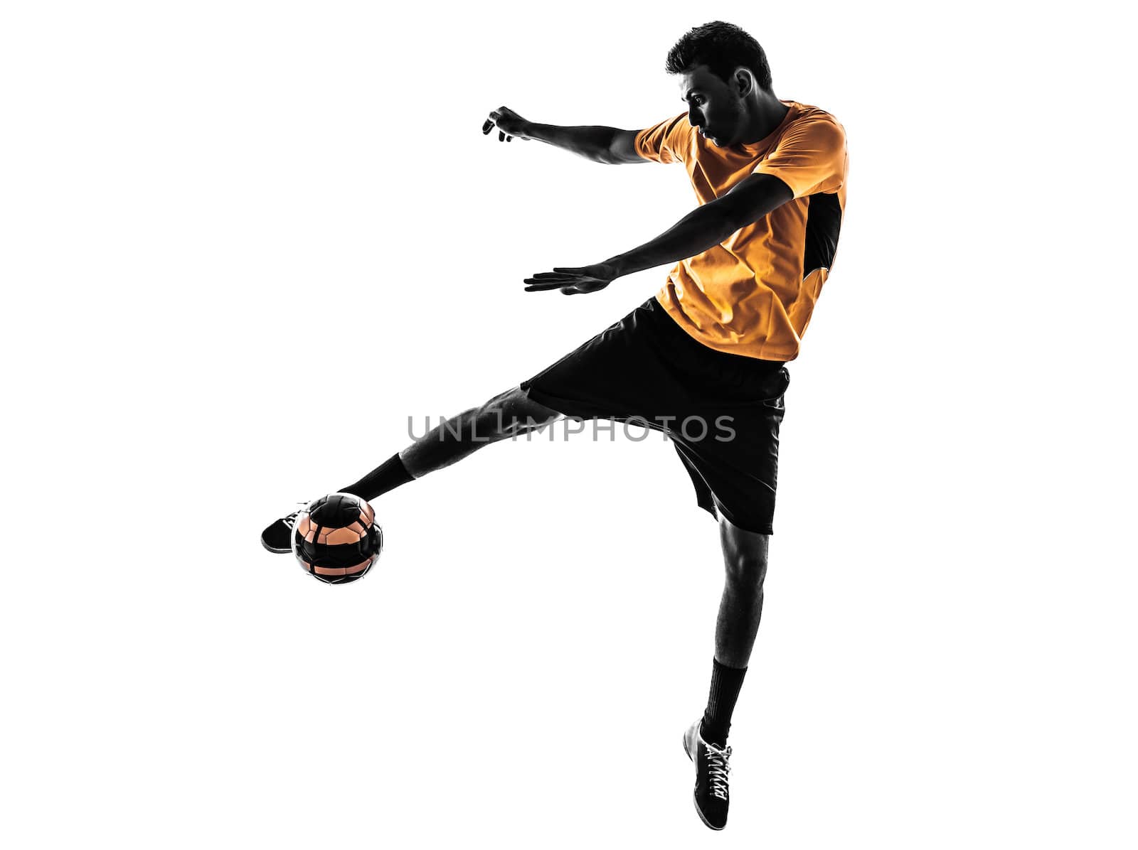 one caucasian young man soccer player orange jersey in silhouette  on white background