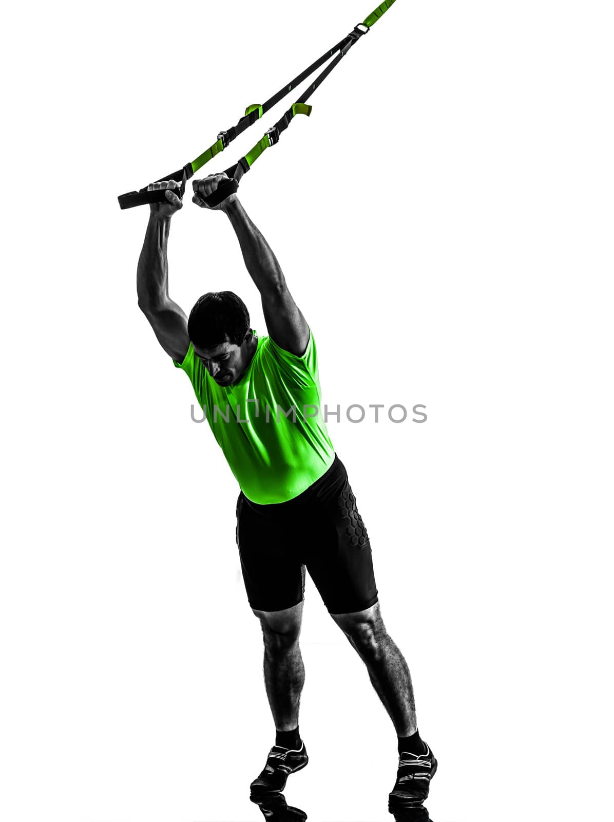 one caucasian man exercising   suspension training  trx   on white background