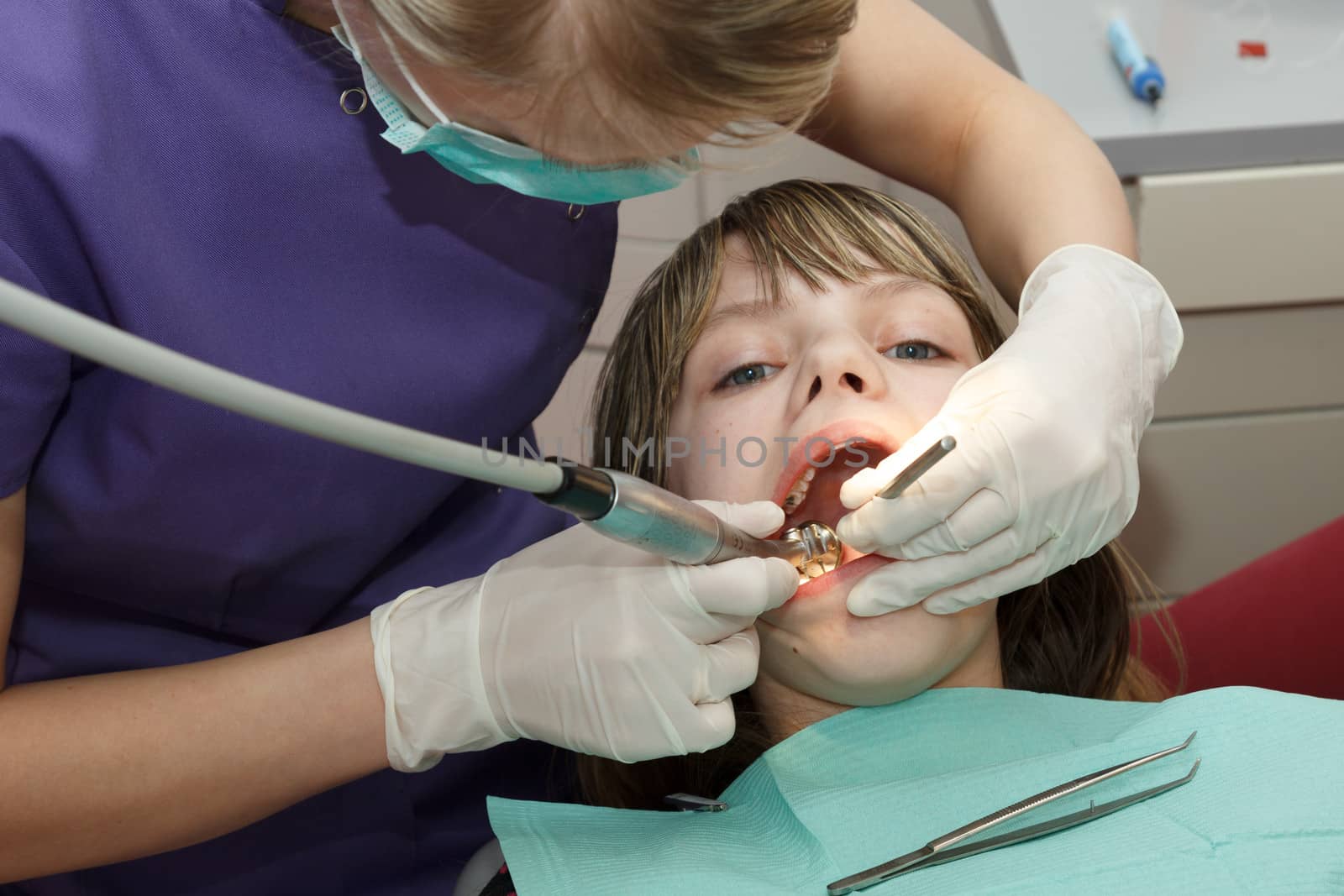 dentist drilled young girl tooth