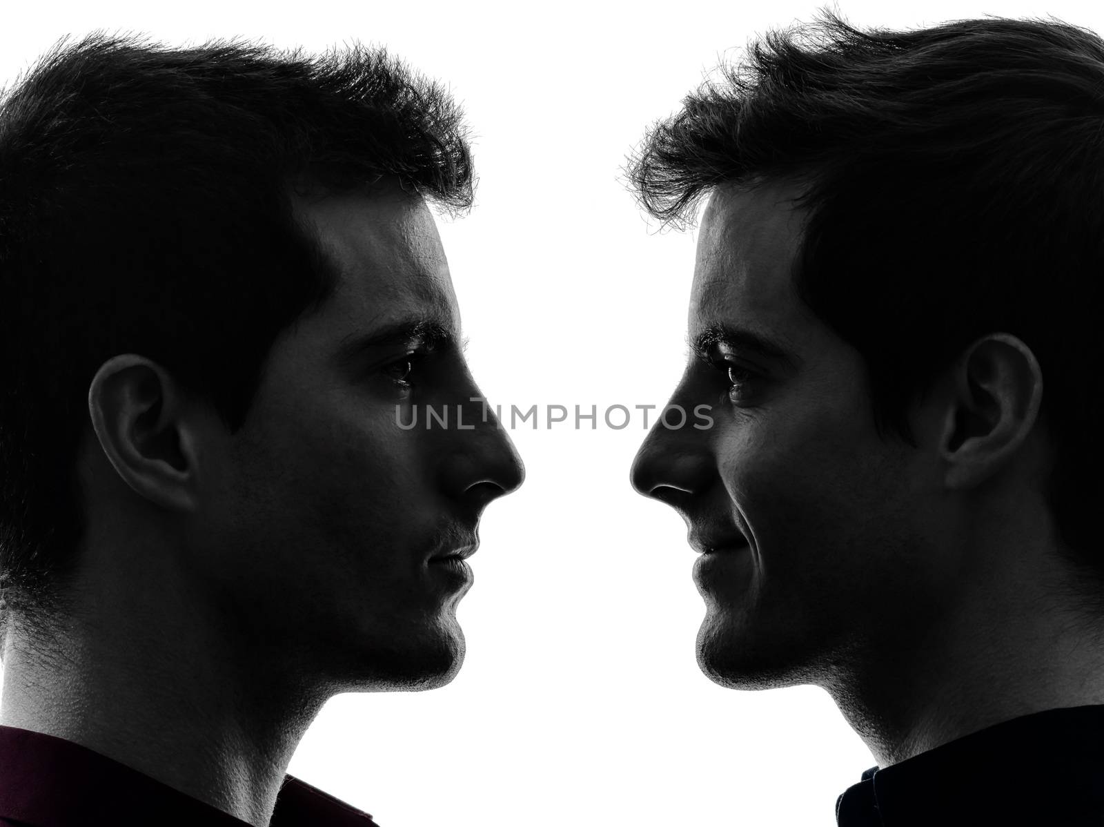 close up portrait two  men twin brother friends silhouette by PIXSTILL