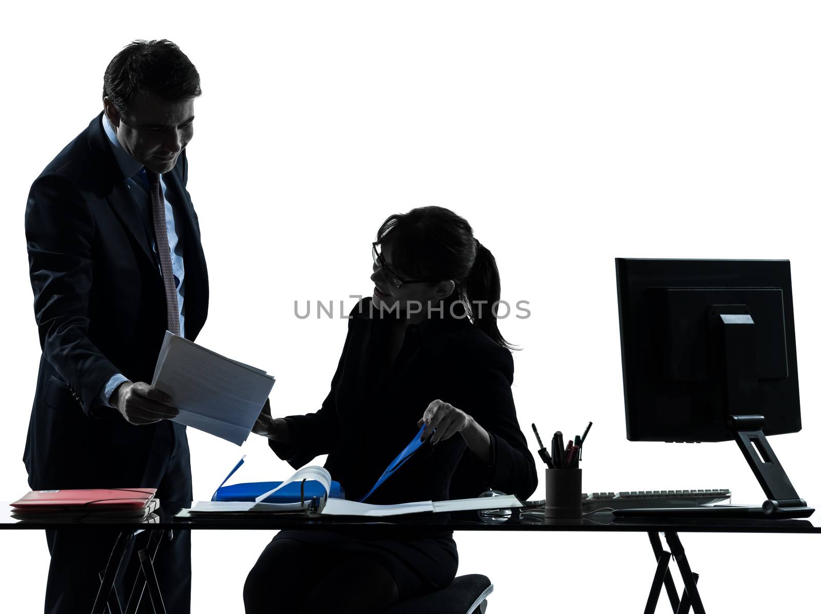one caucasian business woman man couple  in silhouette studio isolated on white background