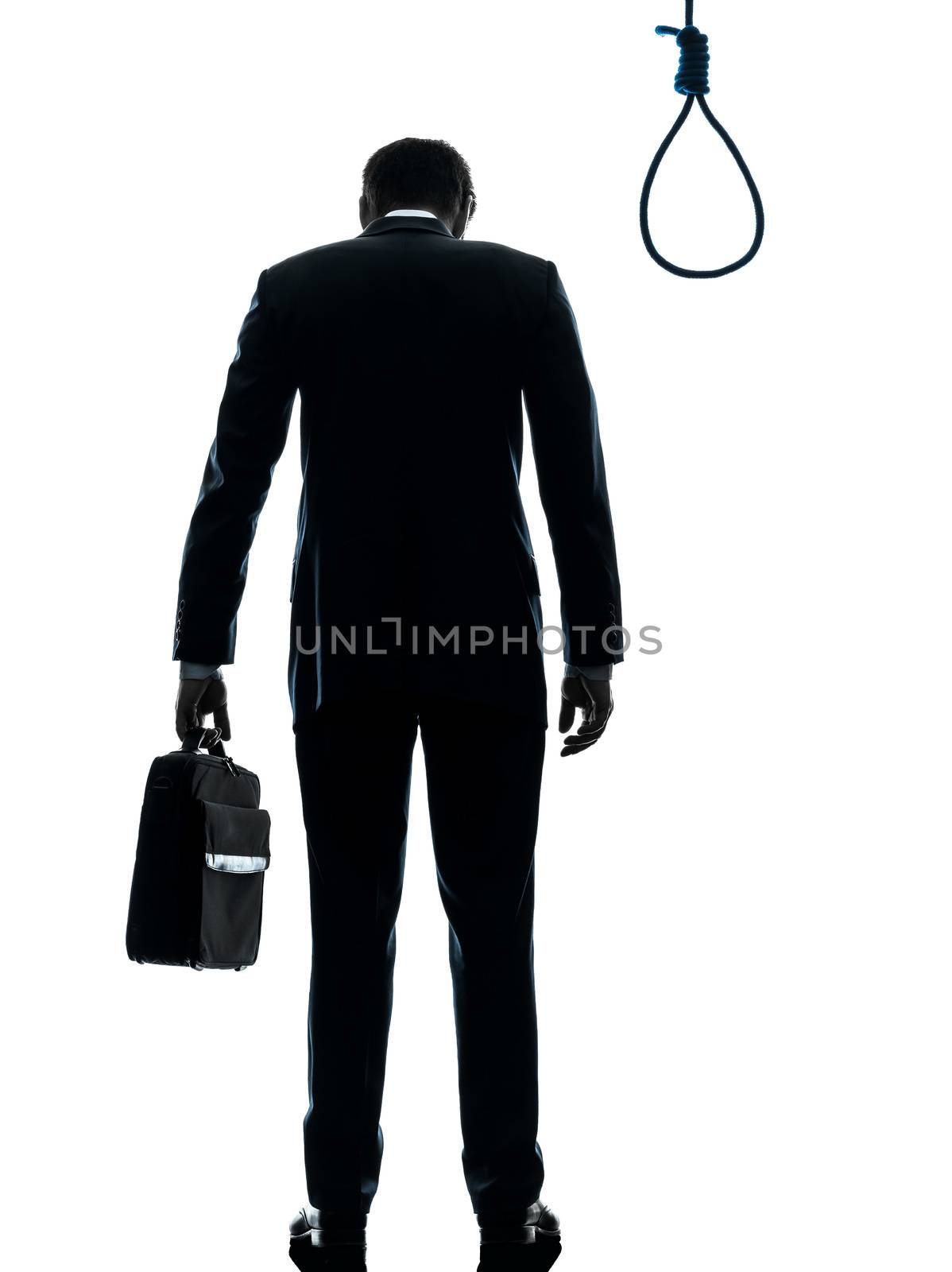 one caucasian business man  rear view standing in front of hangman's noose in silhouette studio isolated on white background