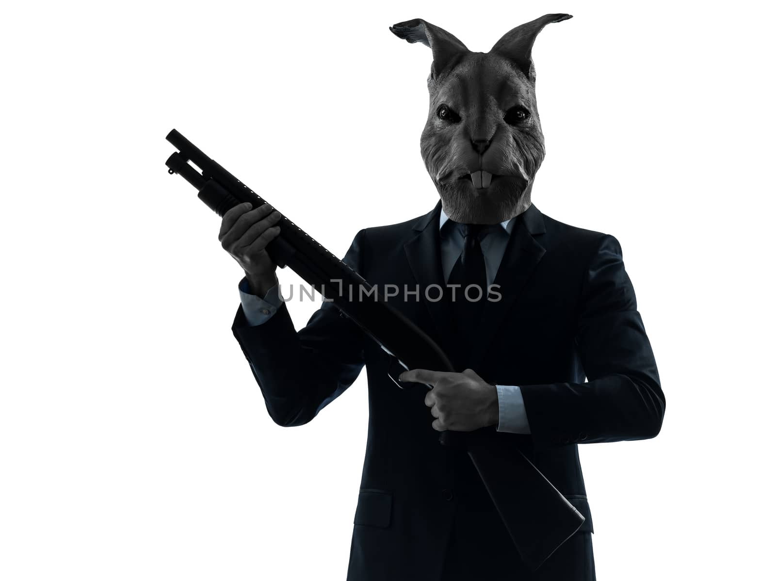 one caucasian man rabbit mask hunting with shotgun portrait in silhouette studio isolated on white background