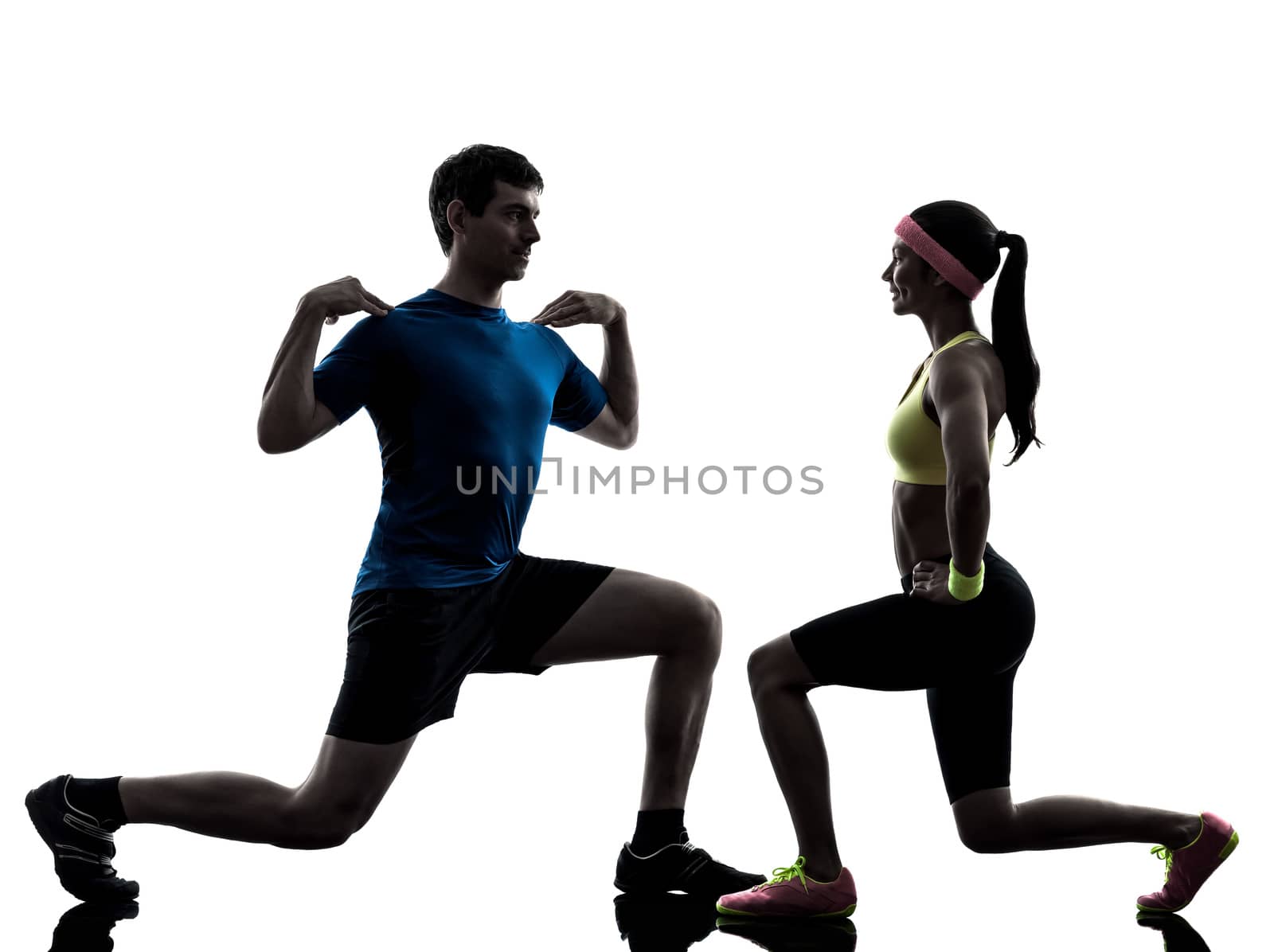 one  woman exercising fitness workout with man coach in silhouette  on white background