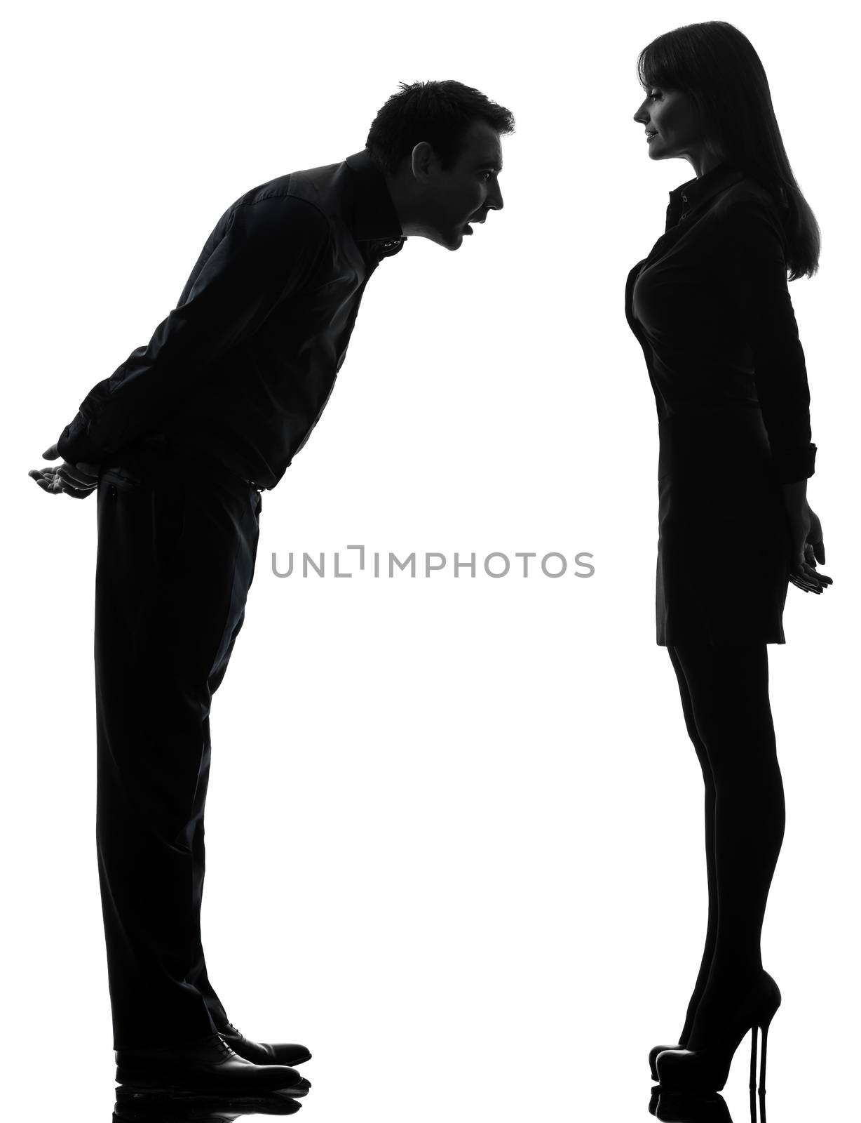 one caucasian couple woman seducing man in silhouette studio isolated on white background