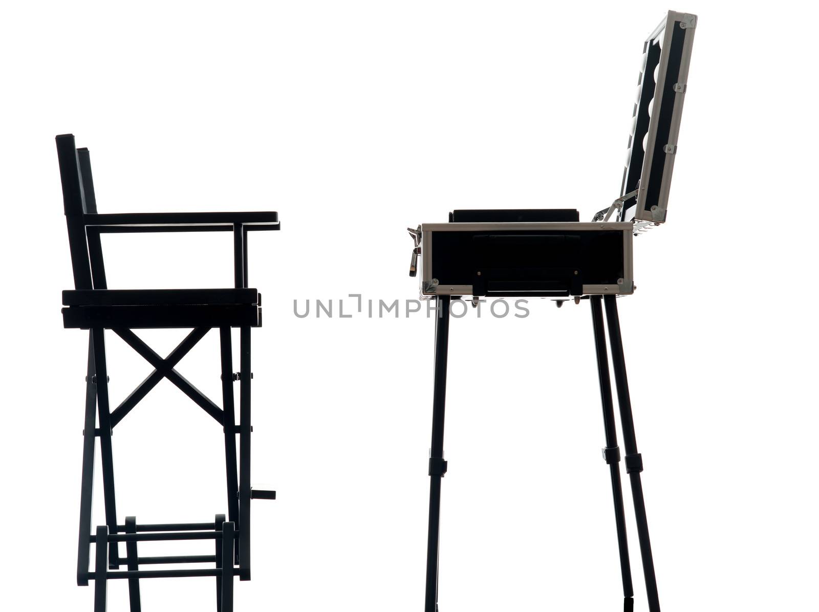 one  make up artist suitcase with   chair in silhouette  on white background