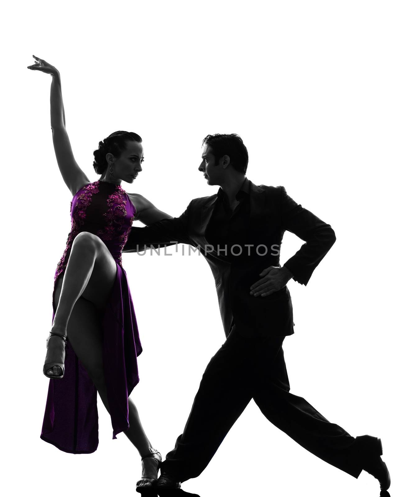 one caucasian couple man woman ballroom dancers tangoing  in silhouette studio isolated on white background