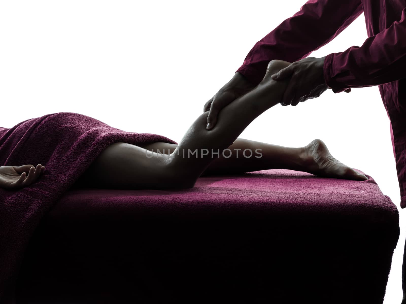 man woman legs massage therapy in silhouette studio on white background