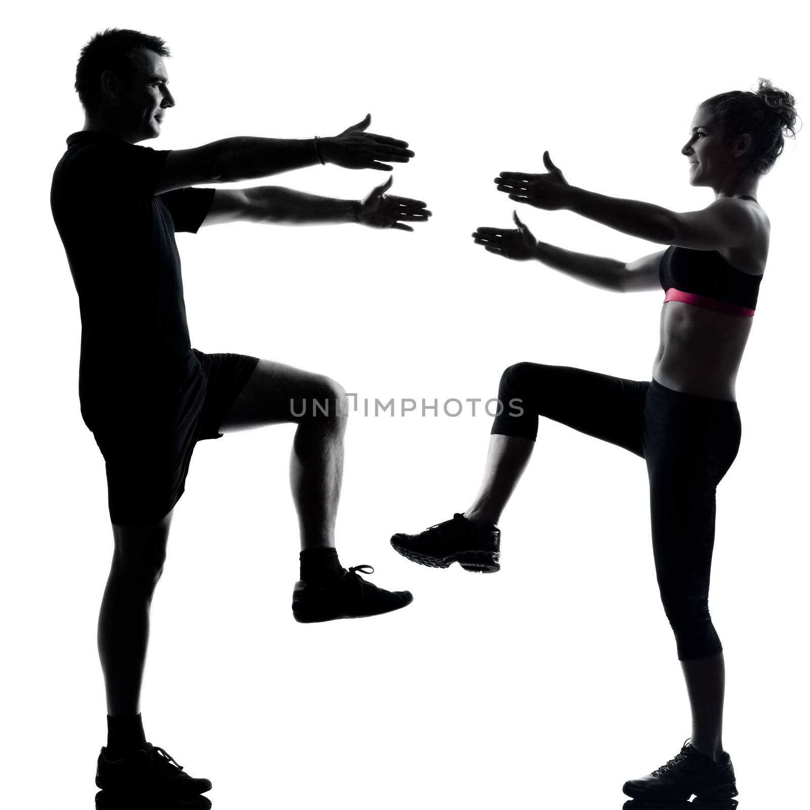 one couple man woman exercising workout fitness by PIXSTILL