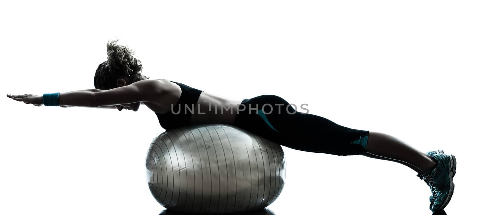 one caucasian woman exercising fitness ball workout posture in silhouette studio isolated on white background