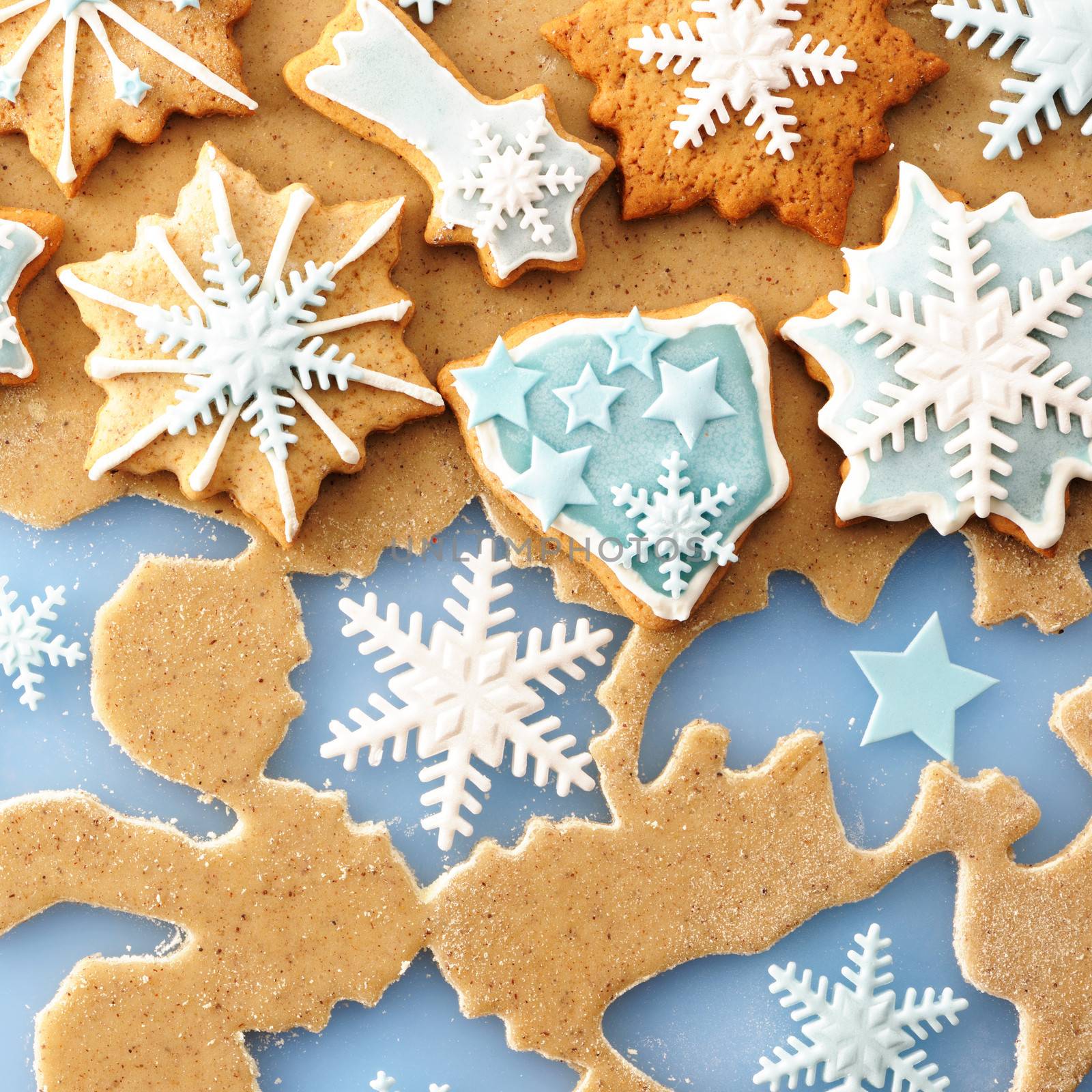 Christmas homemade gingerbread cookies over dough