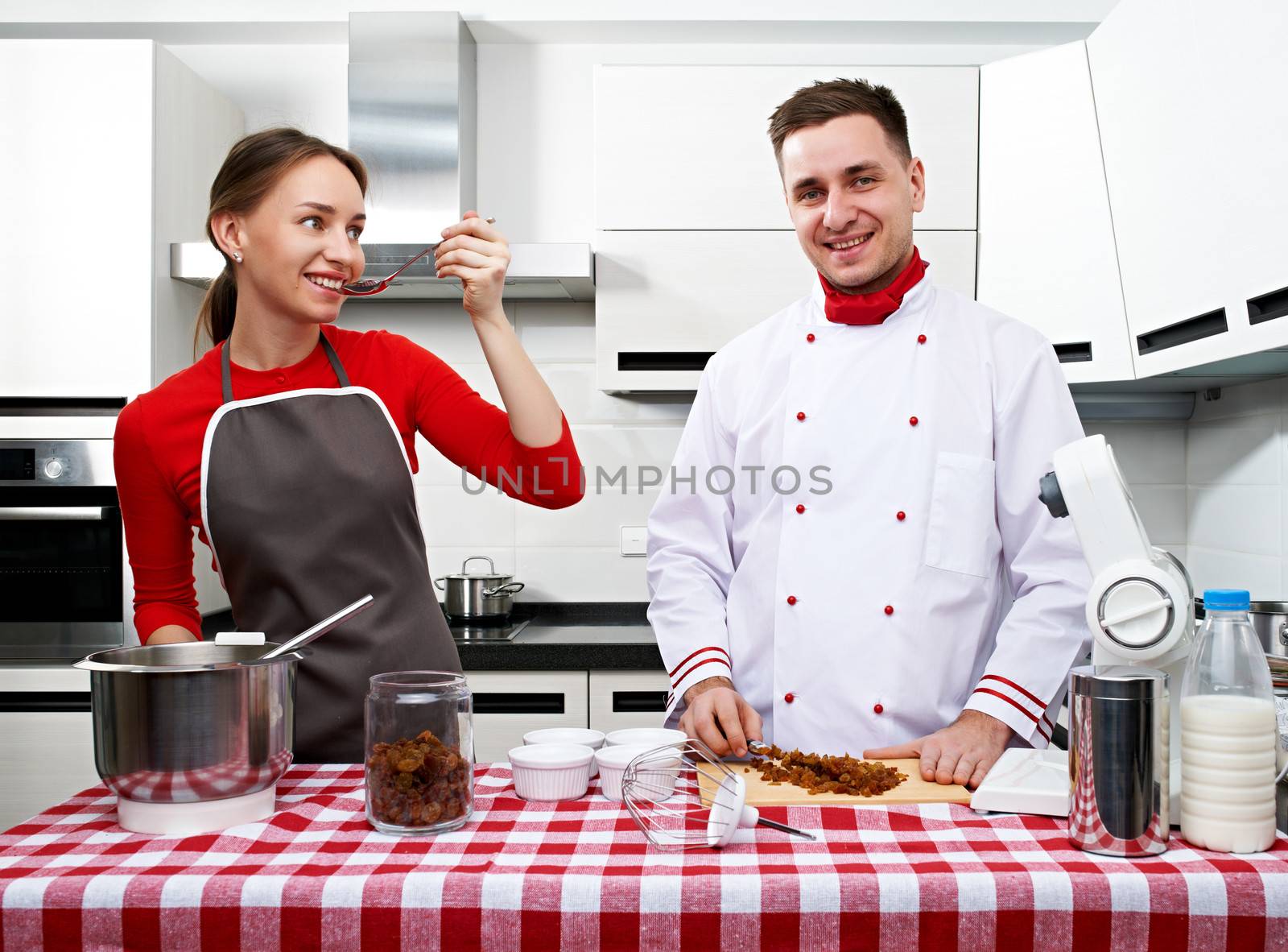 Couple at kitchen by haveseen