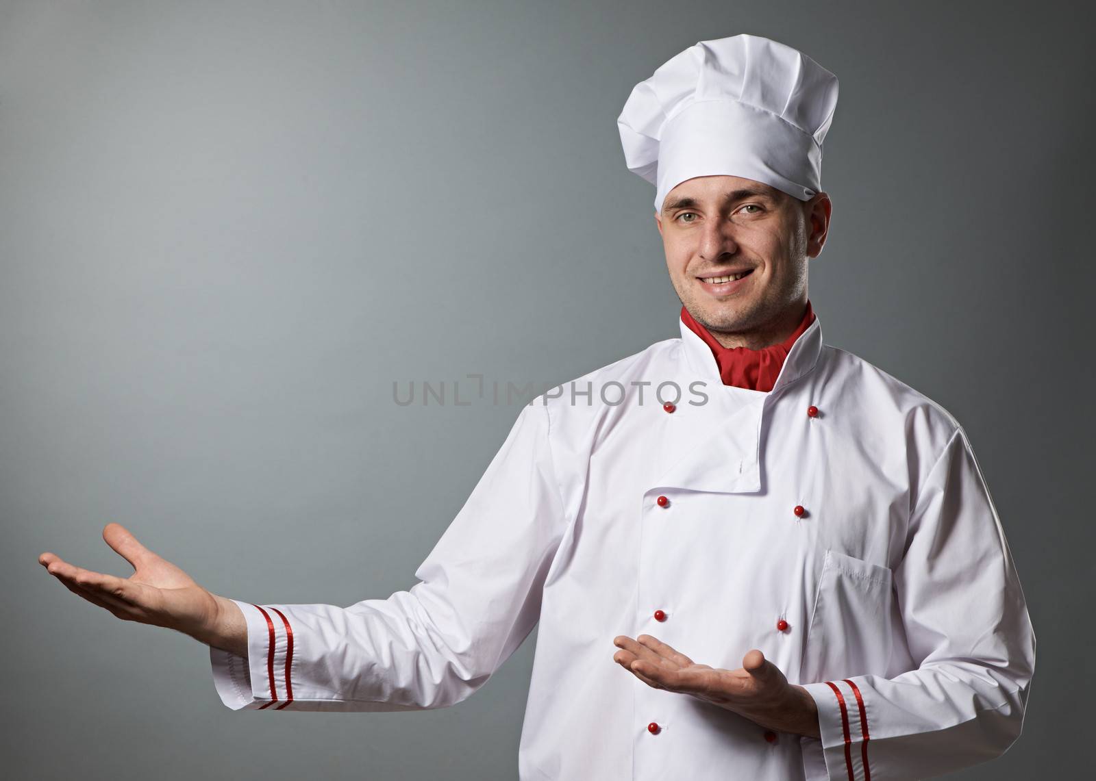 Male chef portrait against grey background