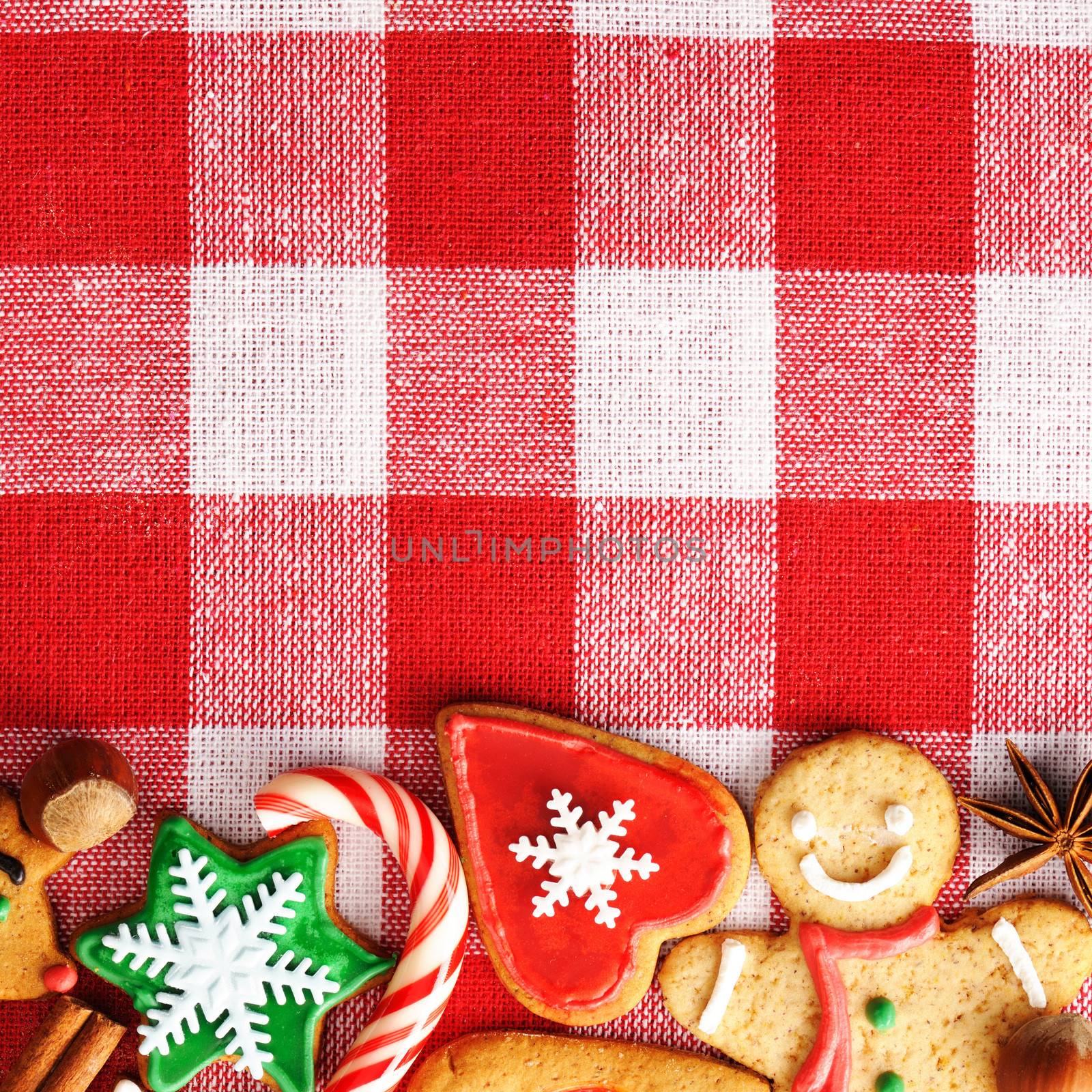 Christmas gingerbread cookies over tablecloth