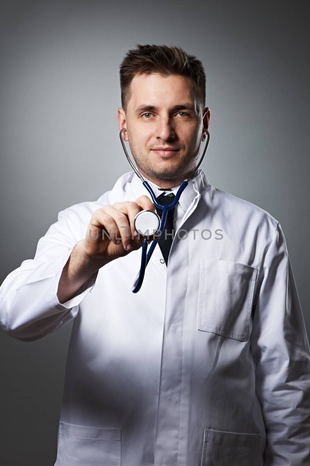 Medical doctor with stethoscope portrait by haveseen