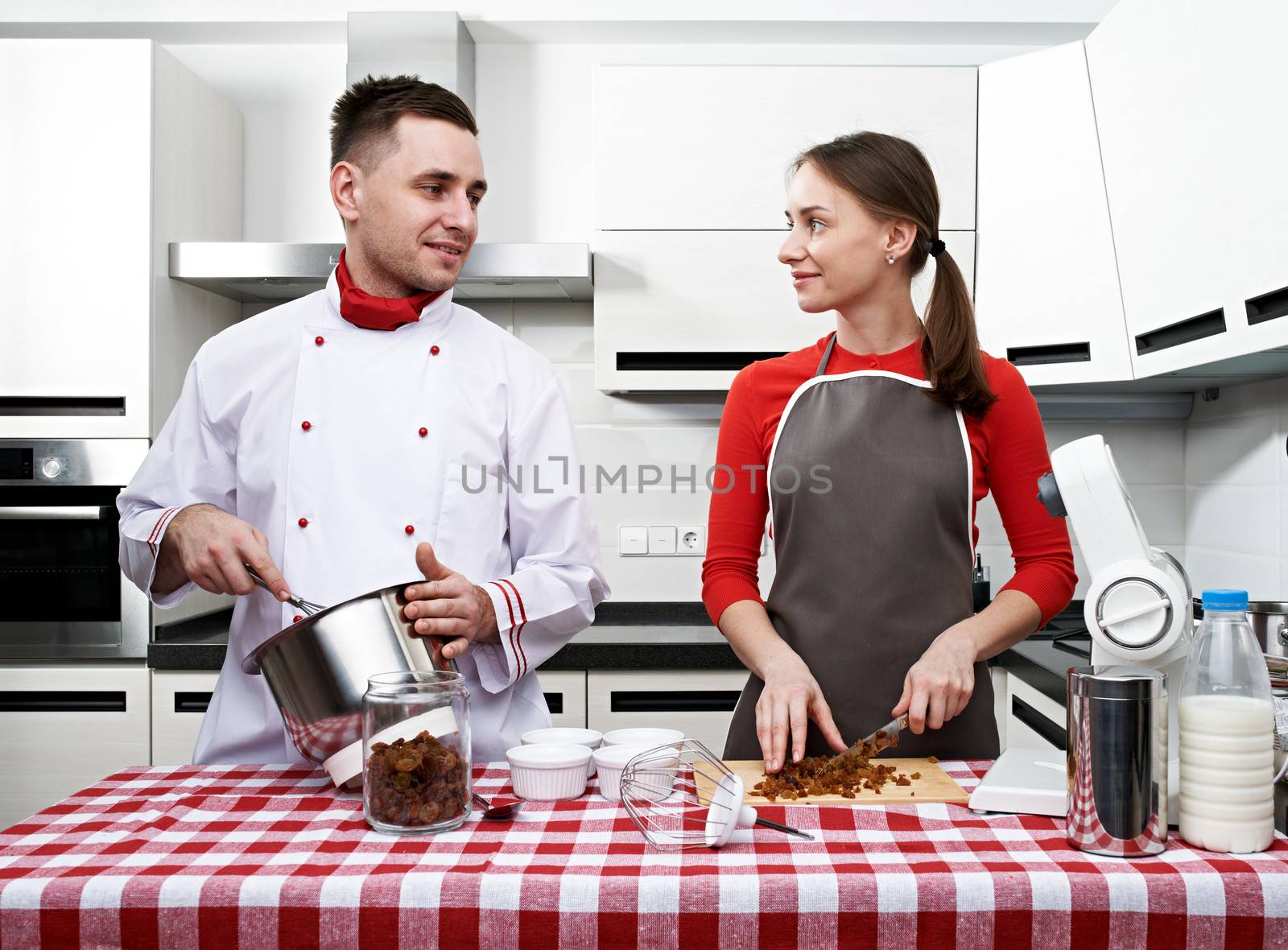 Couple at kitchen by haveseen