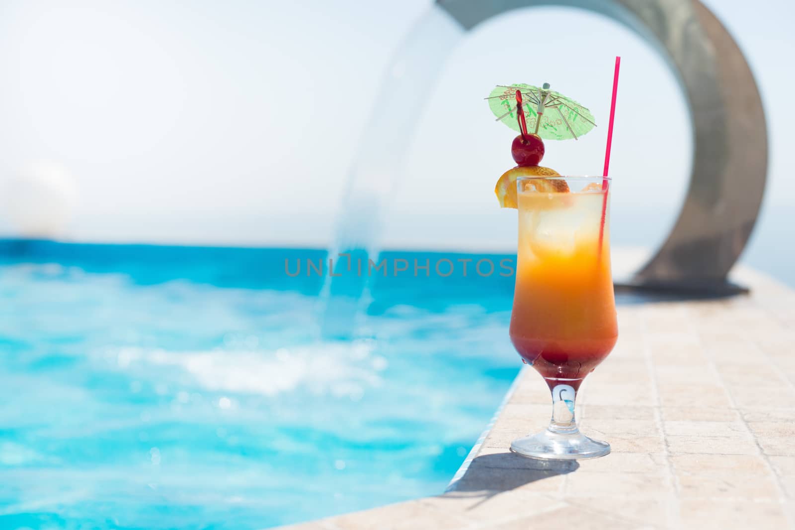 Cocktail near the swimming pool by Nickolya