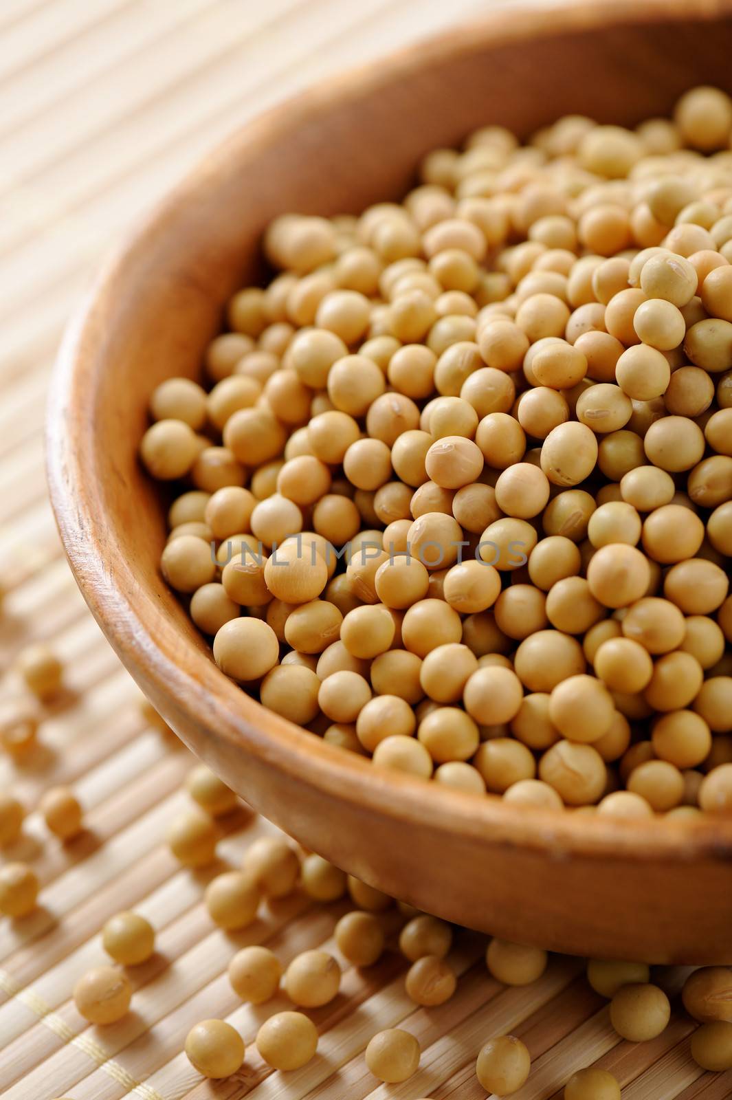 Wooden bowl full of soybeans