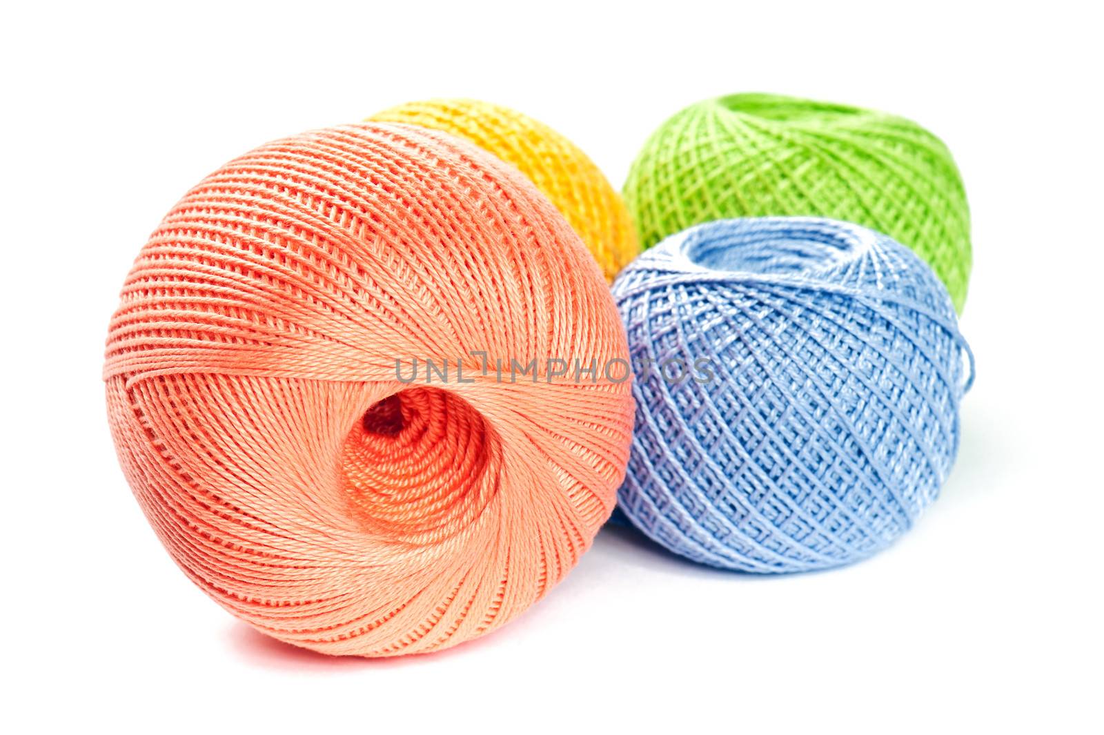 Colorful Knitting Balls on White Baclground