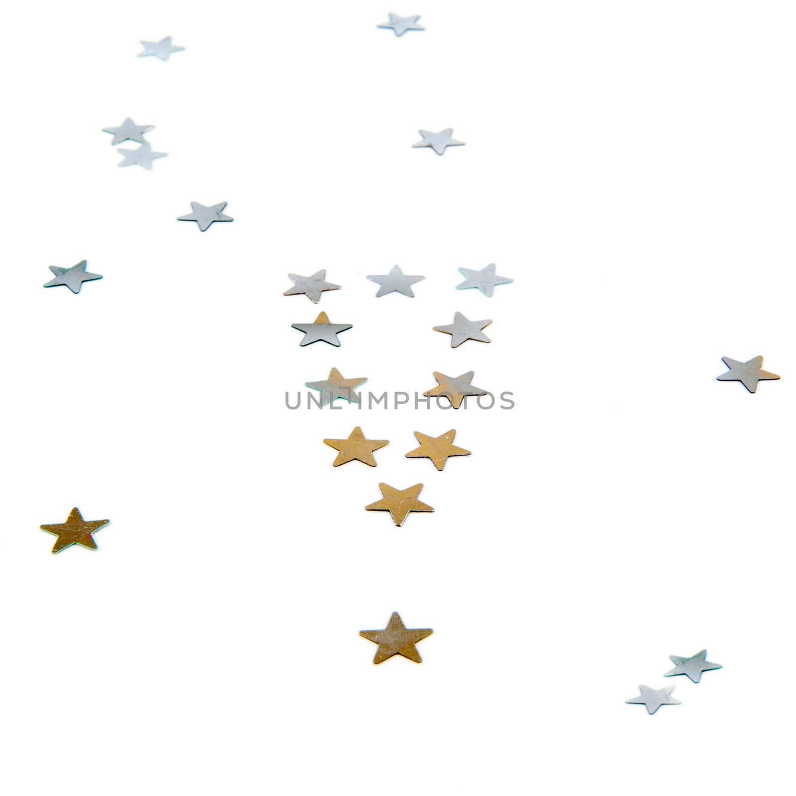 a gold and silver exclamation mark, made of stars on a white background