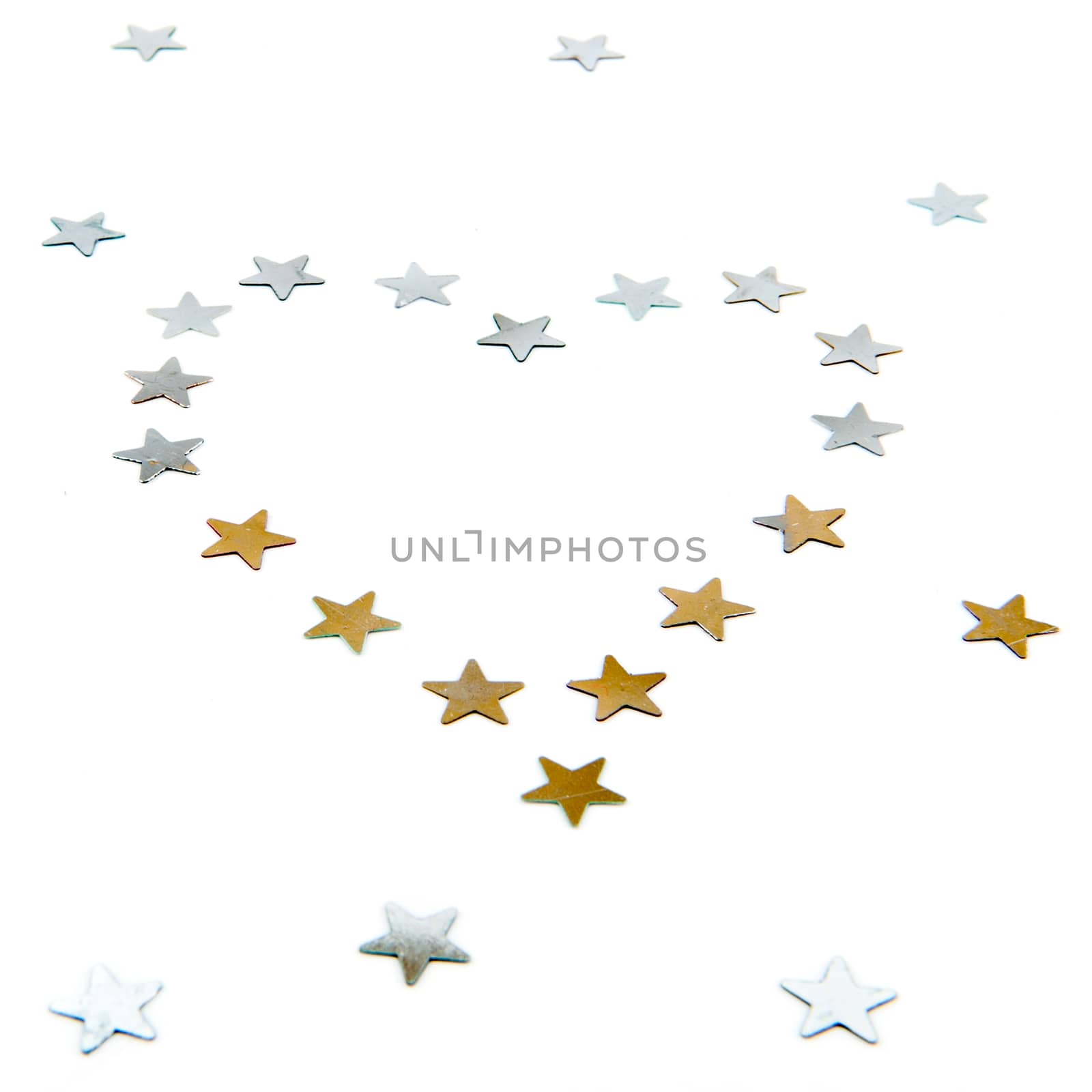a gold and silver heart, made of stars on a white background