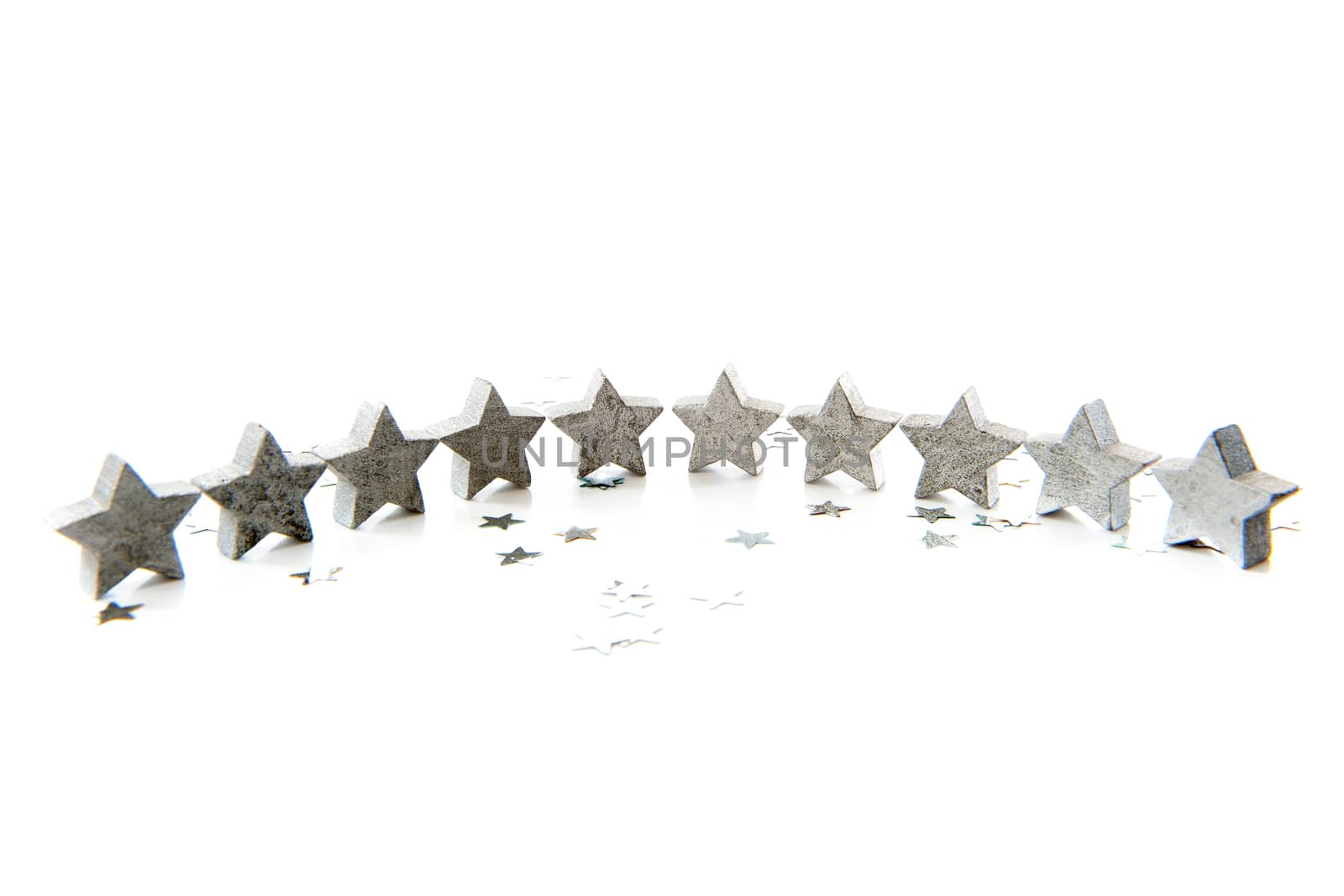 silver stars for christmas in a long row