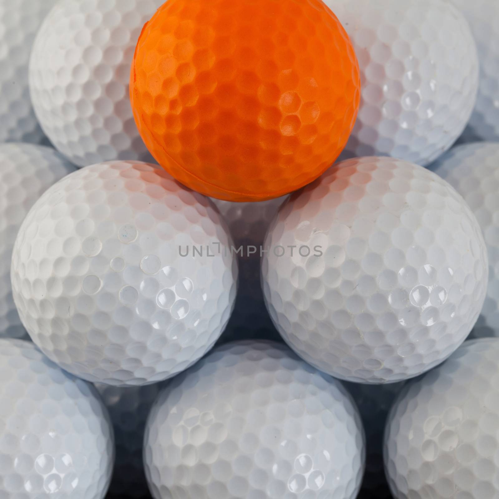 Pyramid of different golf balls