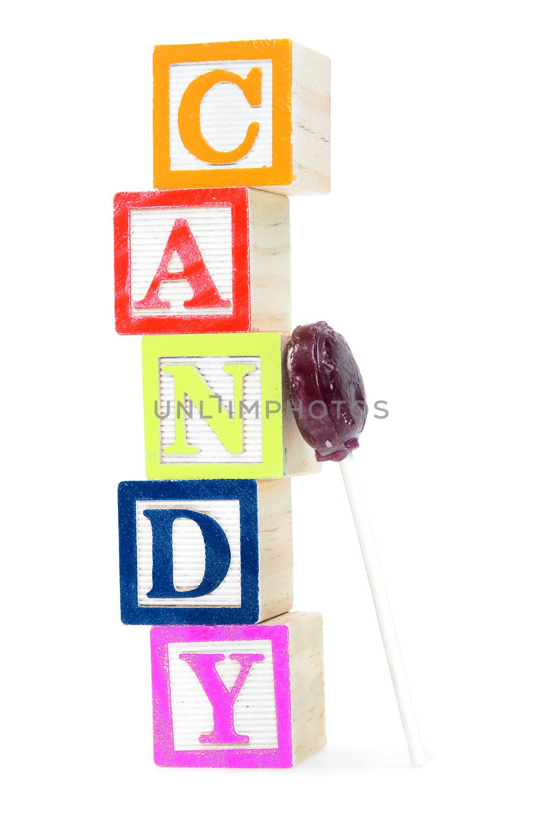 Baby blocks spelling candy. Isolated on a white background.