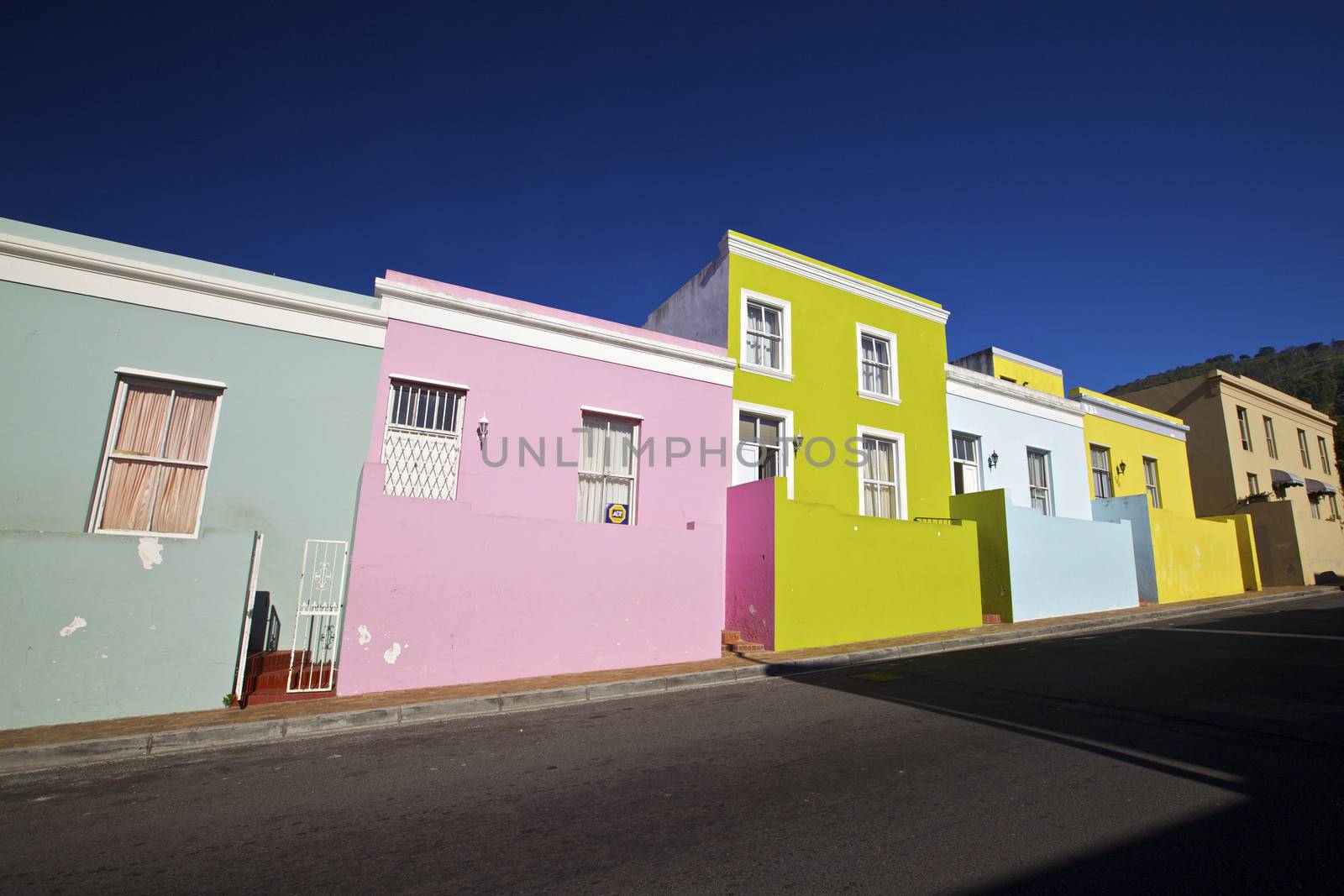 Bo Kaap District Cape Town Western Cape Province South Africa A row of Bright Painted Houses With the Moutains in the Background Very Famous Area in the City Centre and Popular With the Tourist's for Photograph's