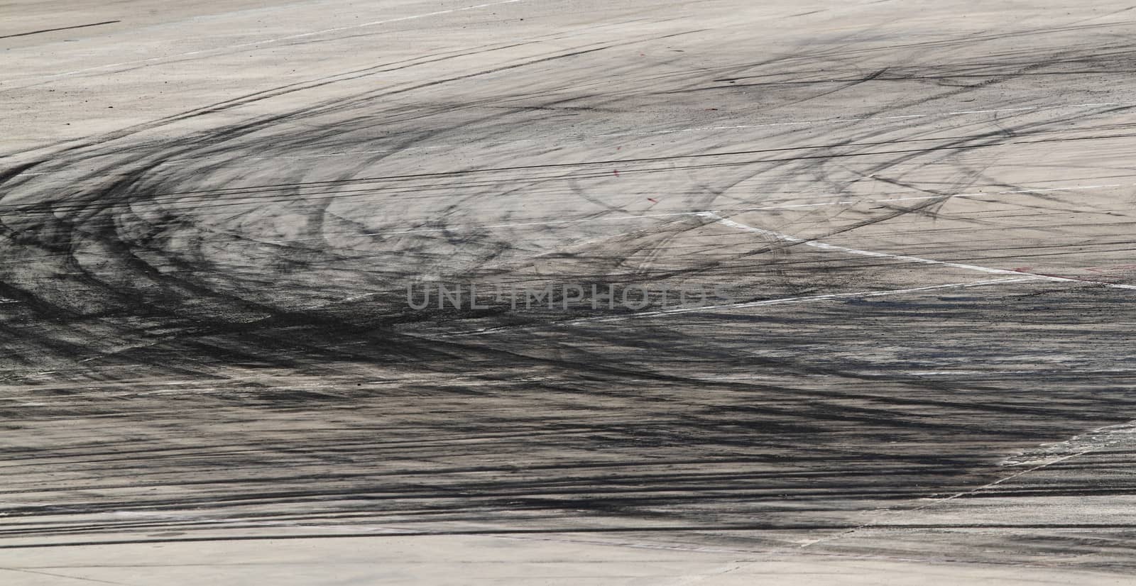 Background with tire marks on road track