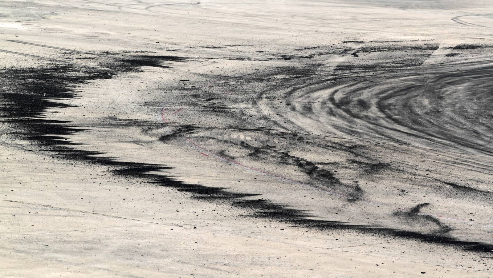 Background with tire marks on road track