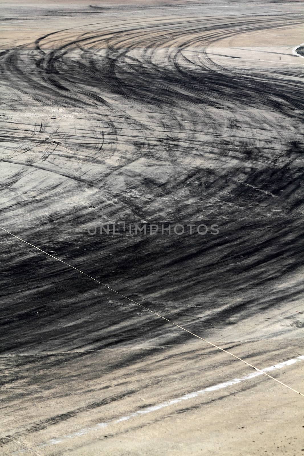 Background with tire marks on road track