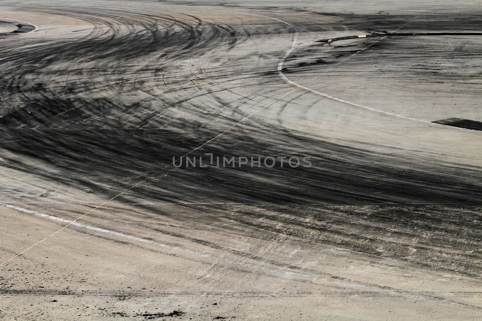Background with tire marks on road track