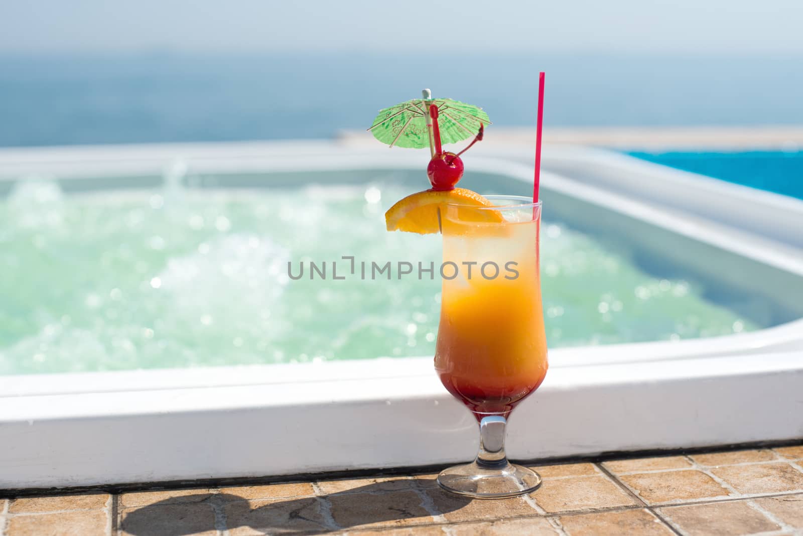 Cocktail near the swimming pool by Nickolya