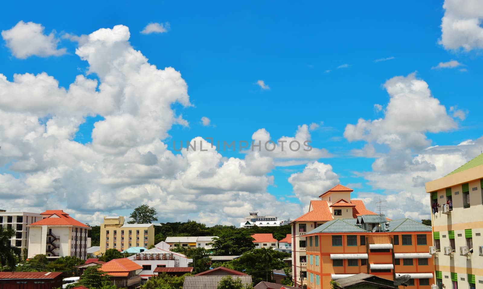 City on blue sky. by apichart