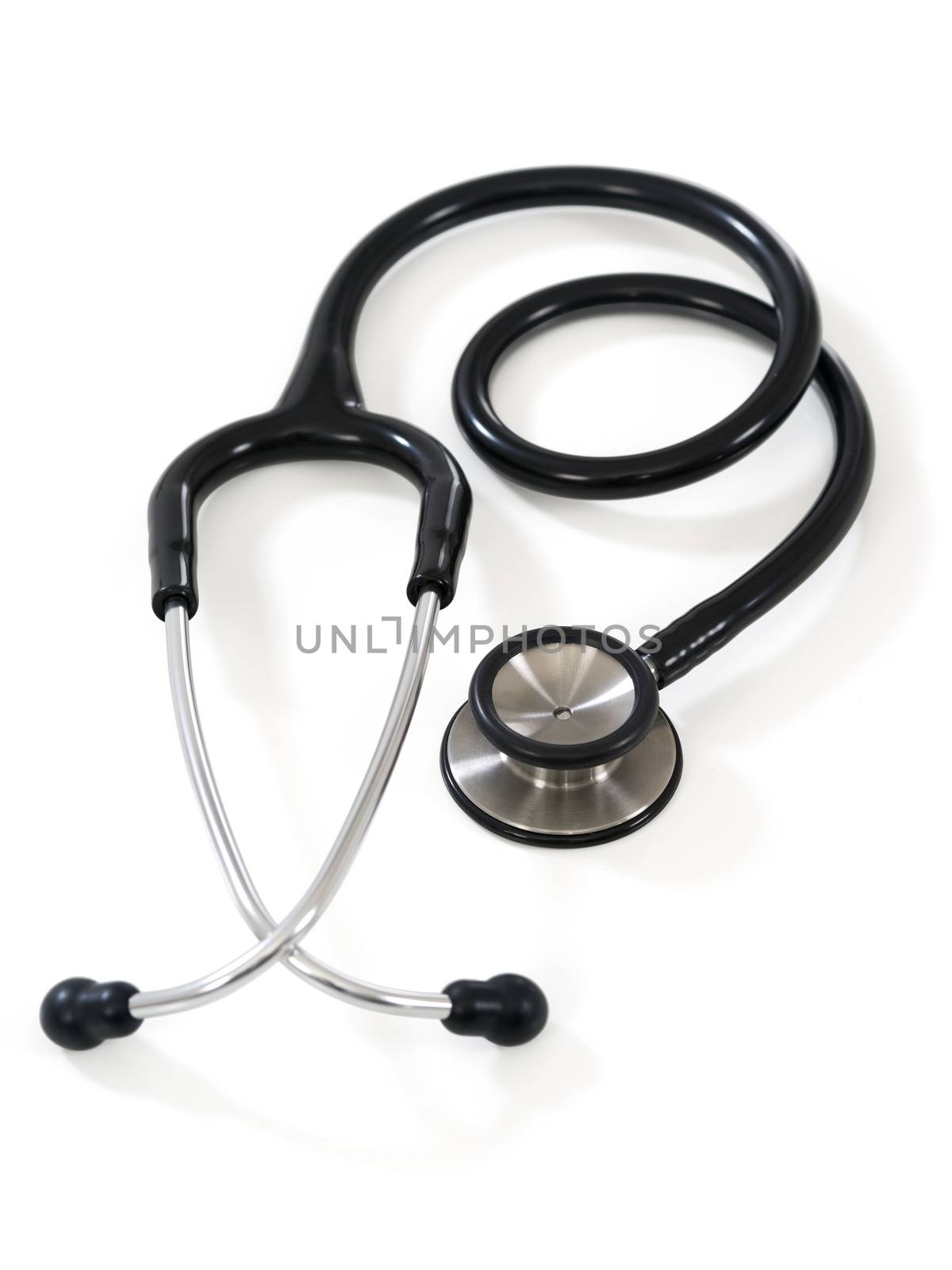 Photo of a stethoscope on white background with slight shadow visible. Clipping path included.
