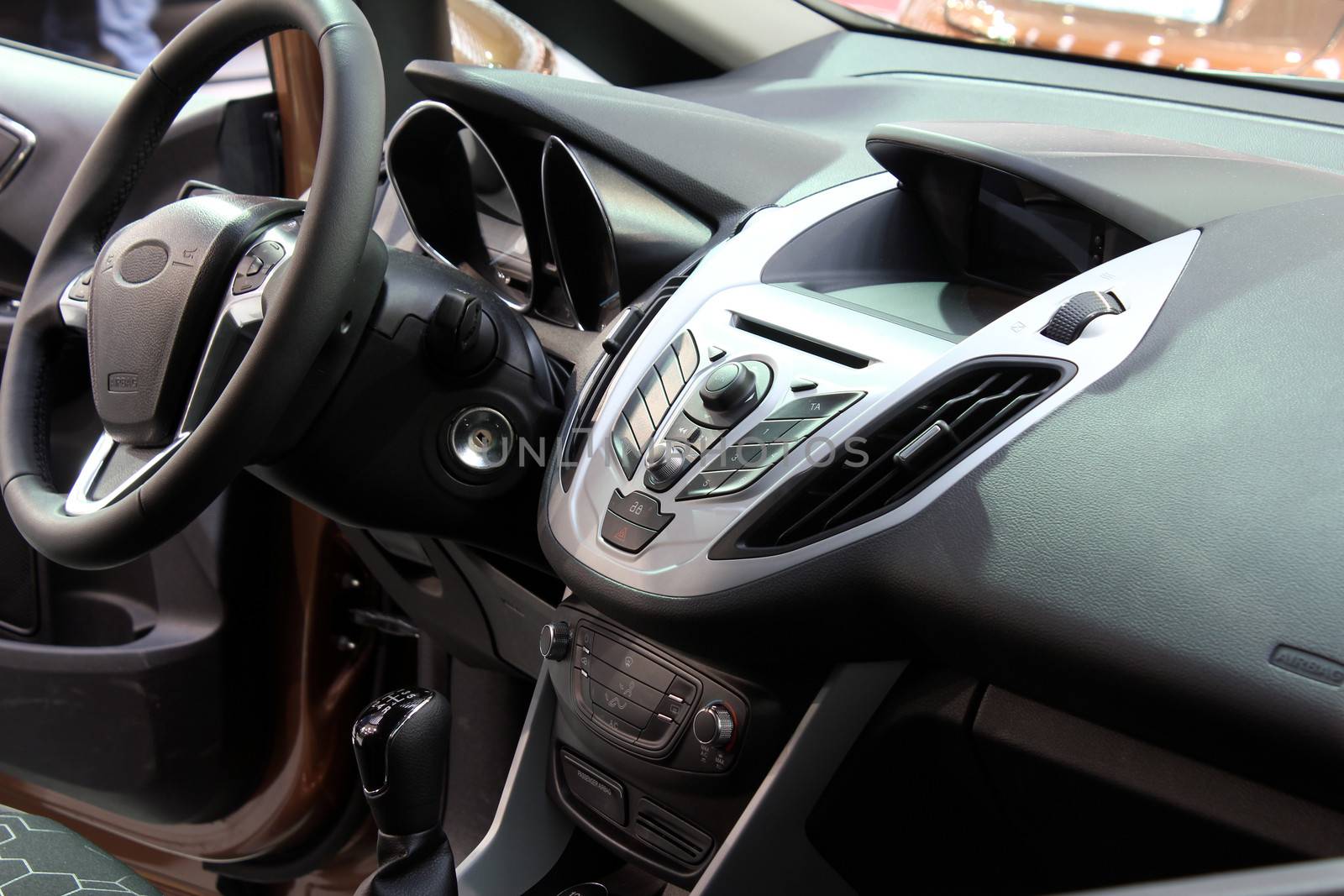 dashboard and steering wheel new car inside by goce