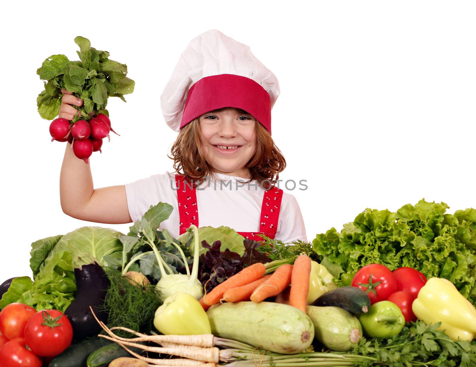 happy little girl cook holding radish vegetables by goce