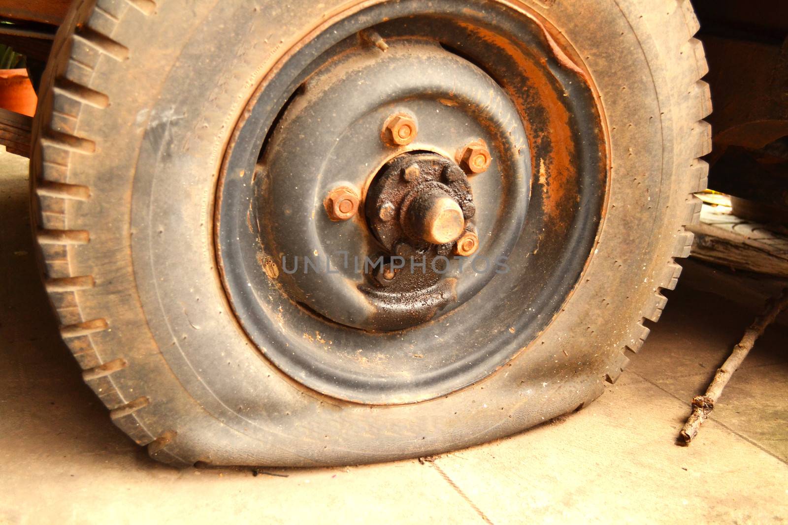 Car tire leak. by apichart