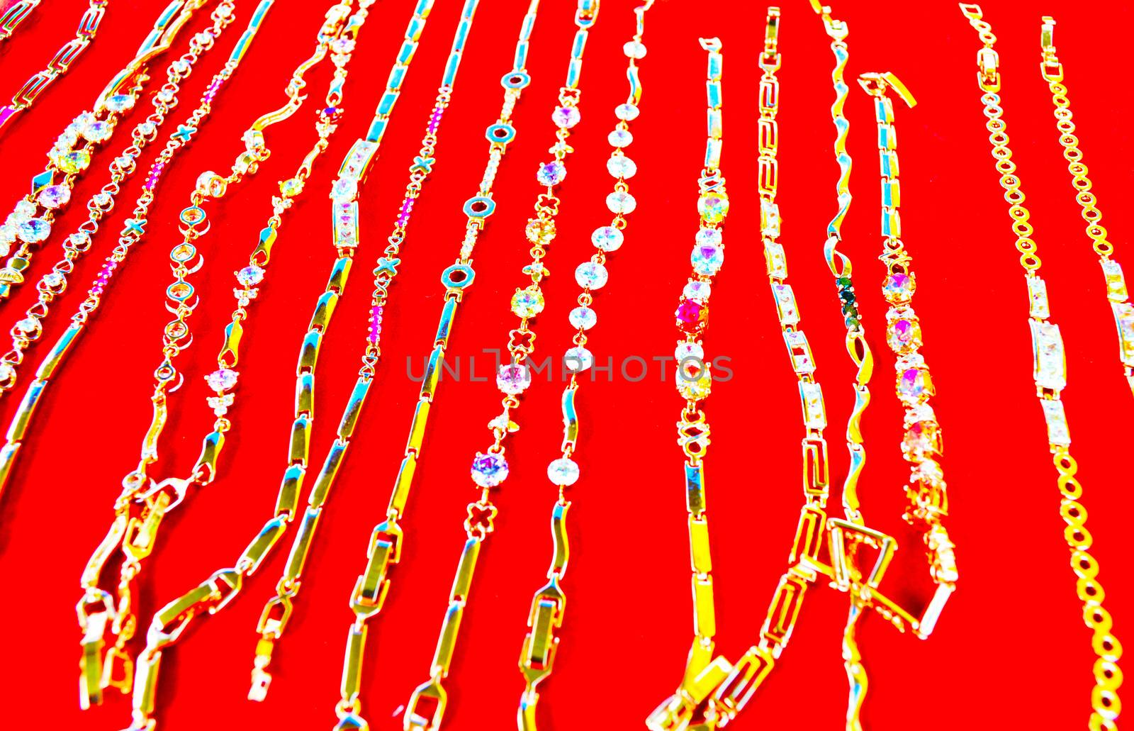 Jewellery on a red background.