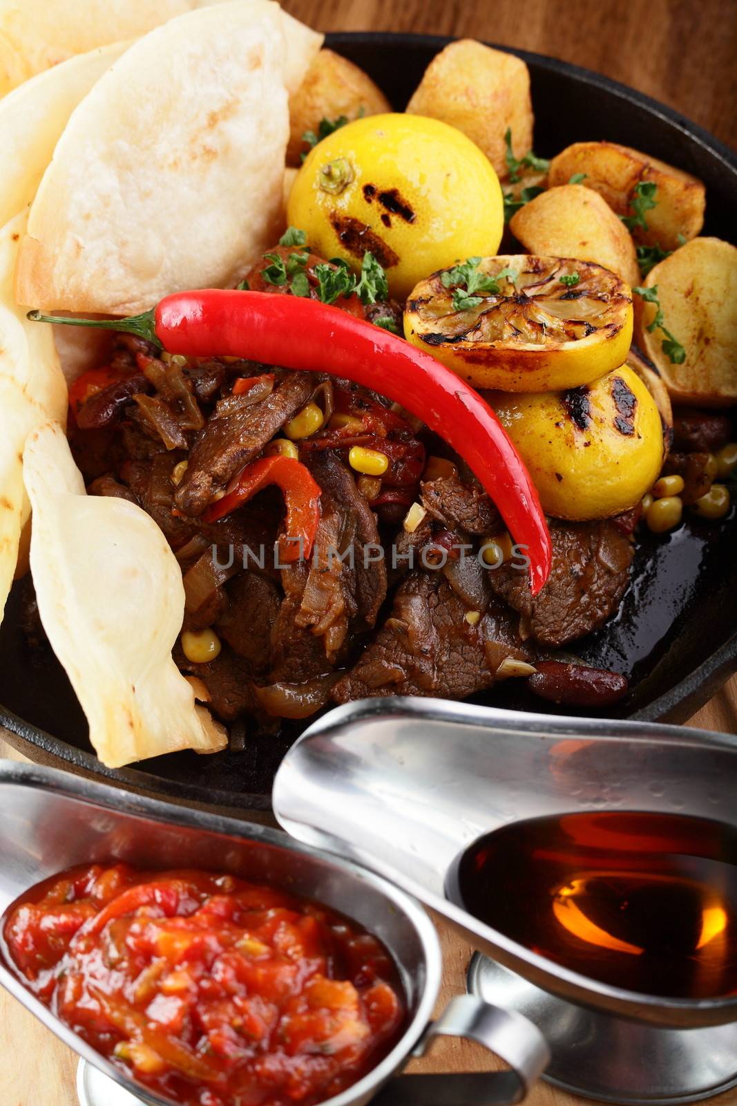 Food on wood table by fiphoto