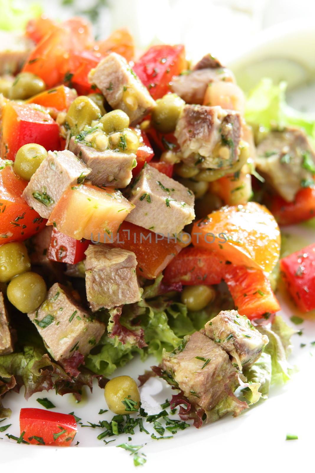 Fresh and tasty salad on the wooden table