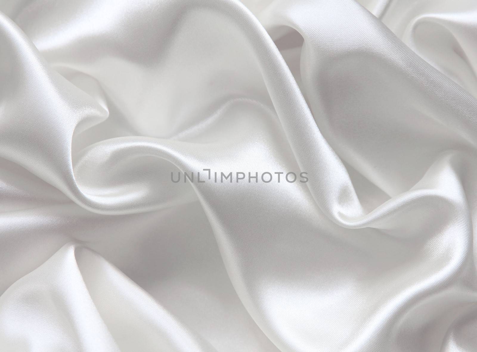 Smooth elegant white silk can use as wedding background 