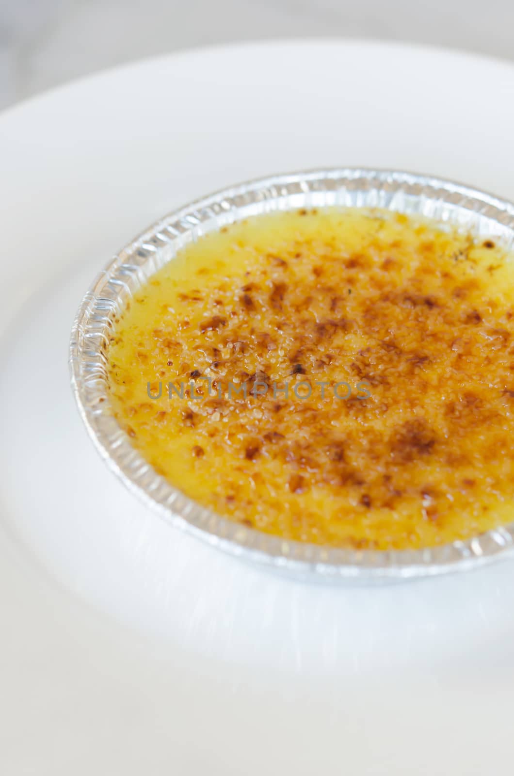 Sweet caramelized custard , French dessert - creme brulee